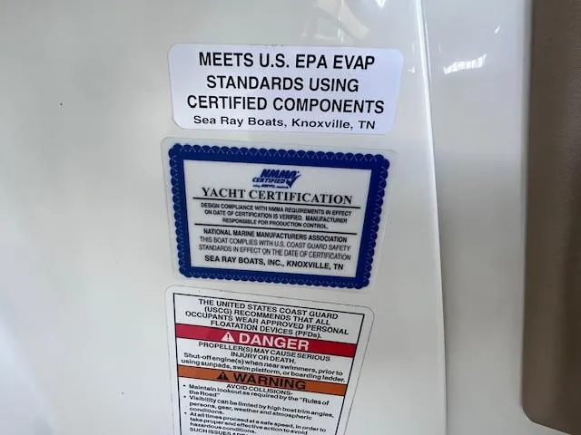 Slide: The Image of 2016 Sea Ray 270 Sundeck certification labels, including EPA compliance and safety warnings. - 26