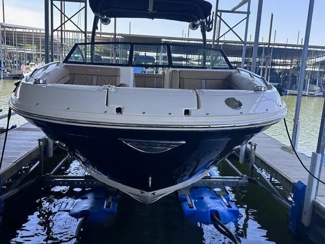 Slide: The Image of 2016 Sea Ray 270 Sundeck boat docked in marina, front view. - 4