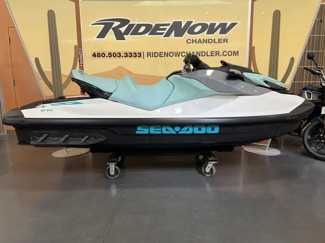 Slide: The Image of 2025 Sea-Doo GTI Waverunner displayed at RideNow Chandler showroom. - 13