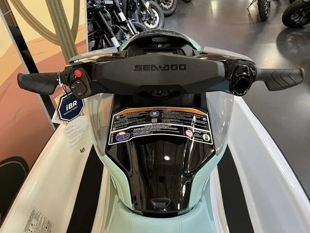 Slide: The Image of 2025 Sea-Doo Waverunner GTI dashboard and handlebars in showroom display. - 6