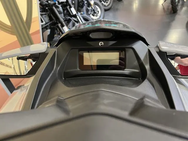 Slide: The Image of 2025 Sea-Doo Waverunner GTI dashboard with digital display in showroom setting. - 8