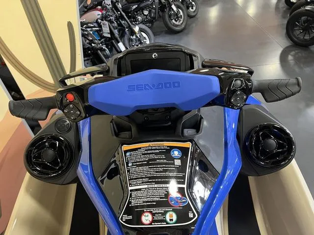 Slide: The Image of 2025 Sea-Doo Waverunner Wake handlebars and dashboard in a showroom setting. - 6
