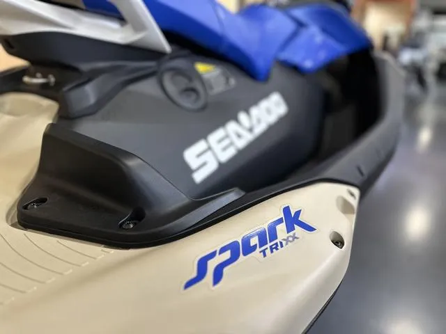 Slide: The Image of 2025 Sea-Doo Spark Trixx Waverunner, close-up view of branding and design details. - 12