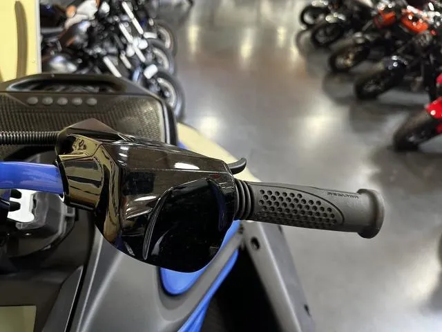 Slide: The Image of Close-up of 2025 Sea-Doo Spark Trixx handlebar in showroom. - 9