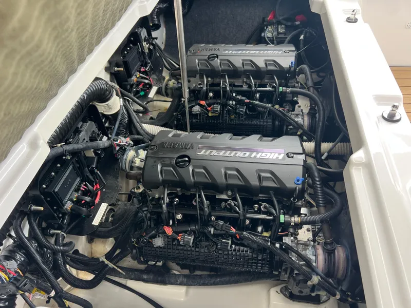 Slide: The Image of 2021 Yamaha Boats 252SE engine compartment with dual high-output engines. - 30