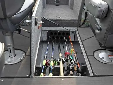 Slide: The Image of 2026 Lund 2075 Tyee boat with fishing rod storage compartment open. - 5