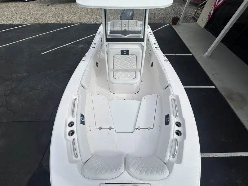 Slide: The Image of 2025 Sea Fox 248 Commander boat interior, featuring spacious seating and modern design. - 12