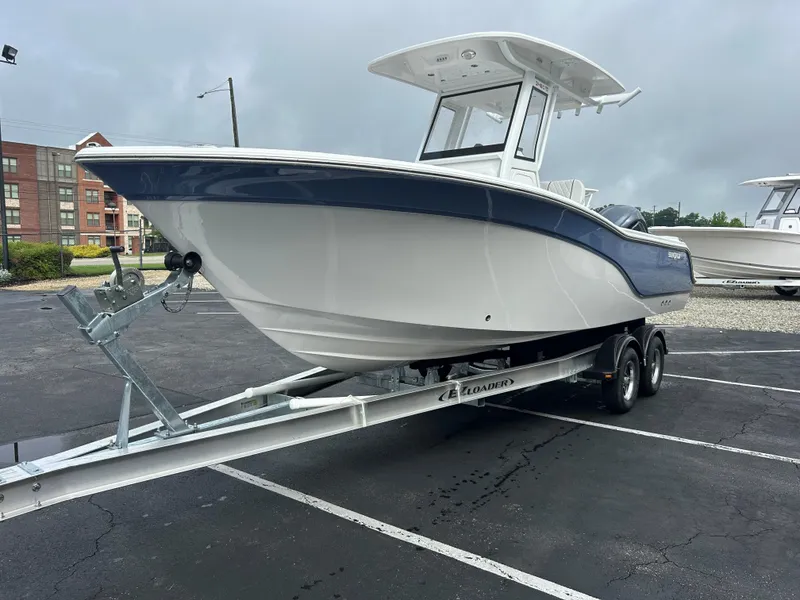 Slide: The Image of 2025 Sea Fox 248 Commander boat on trailer in parking lot. - 3