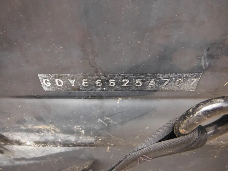 Slide: The Image of VIN plate on 2007 Hurricane SD 237 boat, displaying serial number GDYE6625A707. - 12
