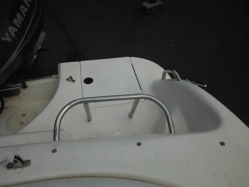 Slide: The Image of 2007 Hurricane SD 237 boat deck with railing and Yamaha engine. - 32