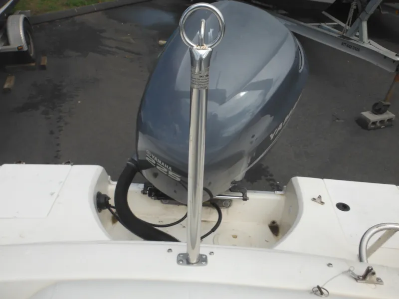 Slide: The Image of 2007 Hurricane SD 237 boat with outboard motor and ski tow bar. - 33