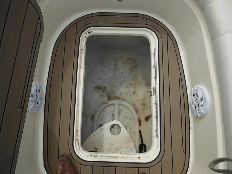 Slide: The Image of Open storage compartment on 2007 Hurricane SD 237 boat deck. - 41