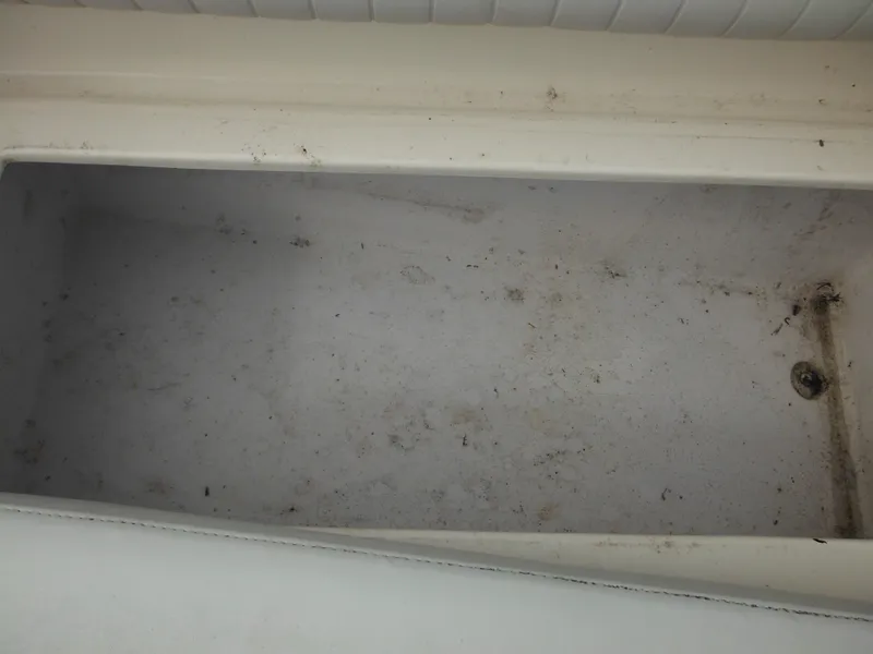 Slide: The Image of Storage compartment of a 2007 Hurricane SD 237 boat, showing interior condition. - 44