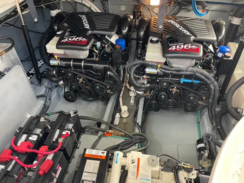 Slide: The Image of Engine room of 2004 Sea Ray 320 Sundancer with twin MerCruiser 496 engines. - 5