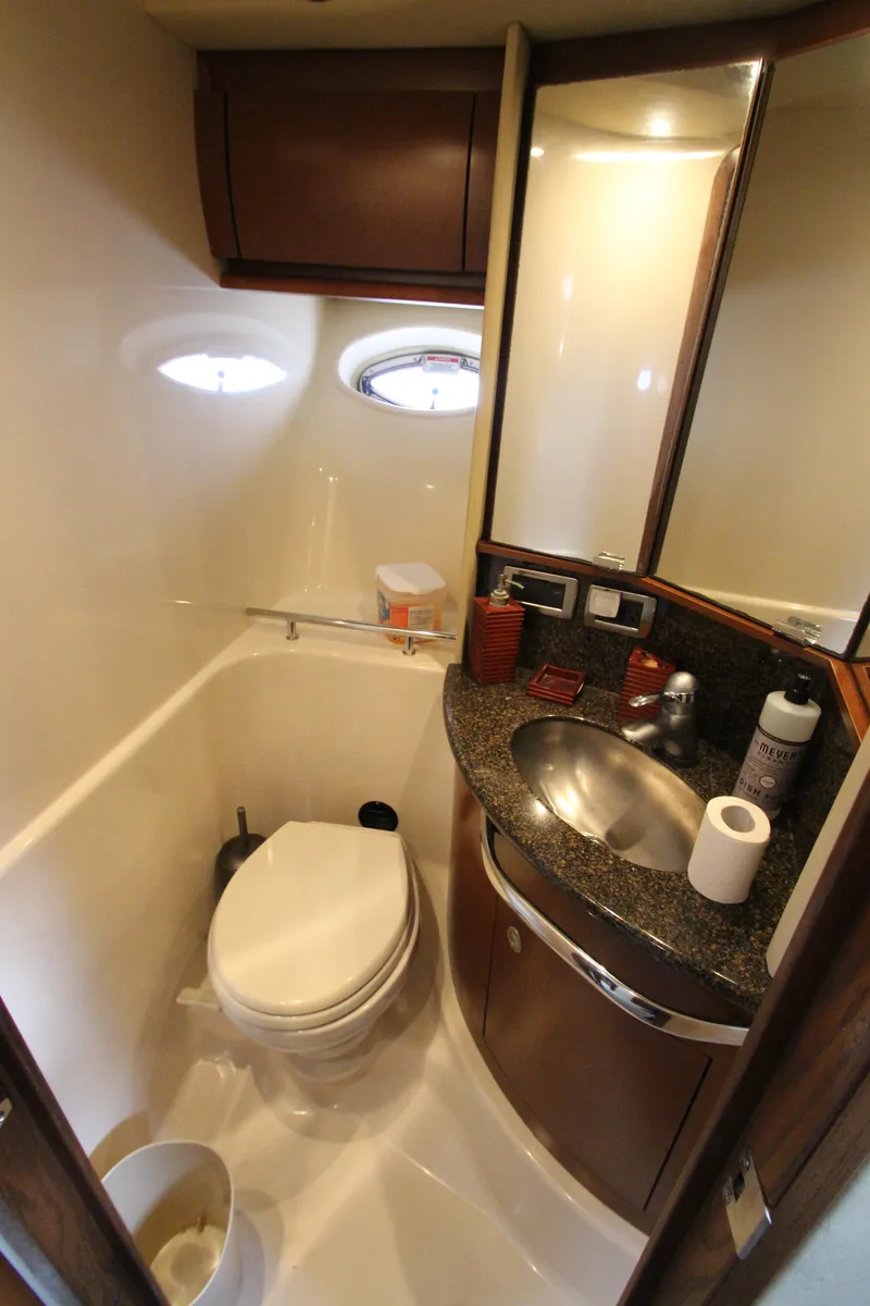 Slide: The Image of 2007 Sea Ray 44 Sundancer bathroom with modern fixtures and compact design. - 39