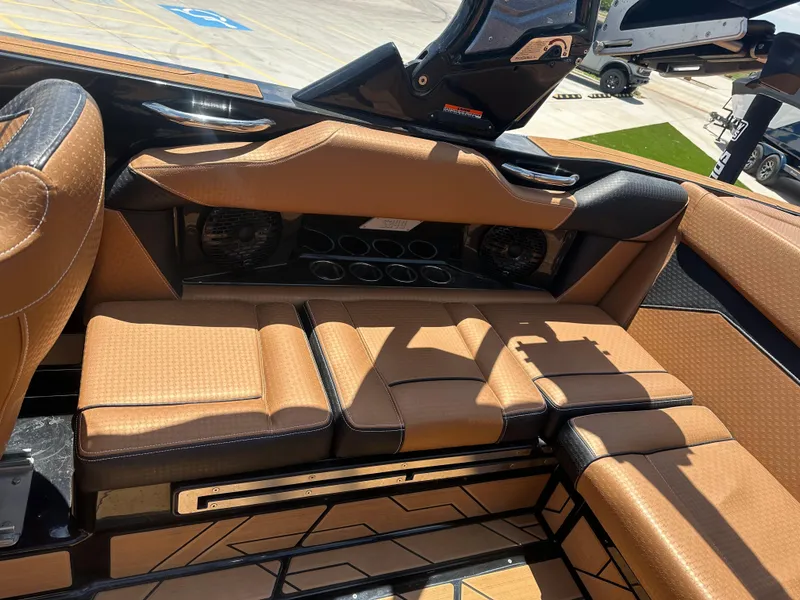 Slide: The Image of Luxurious interior of 2023 Supreme S220 boat with tan leather seating. - 6