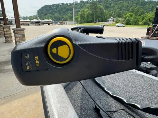 Slide: The Image of Trolling motor on 2025 Lowe Stinger ST175 boat, parked outdoors with scenic background. - 3