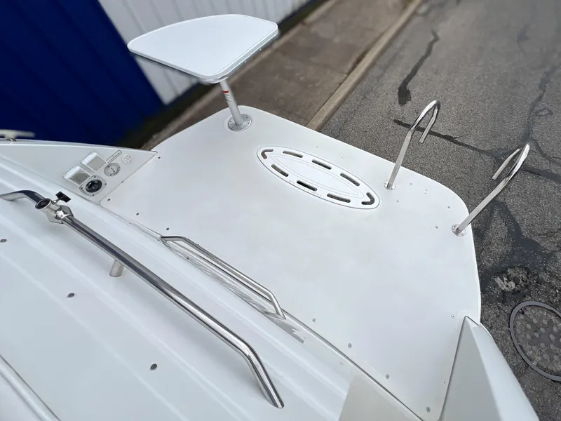 Slide: The Image of Rear deck of a 2004 Formula 27 PC boat with ladder and railing. - 15