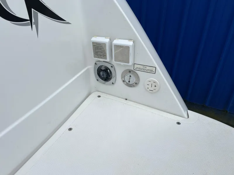Slide: The Image of 2004 Formula 27 PC boat deck with control panel and outlets. - 34