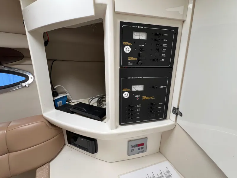 Slide: The Image of Control panel of a 2004 Formula 27 PC boat, featuring AC and DC systems. - 36