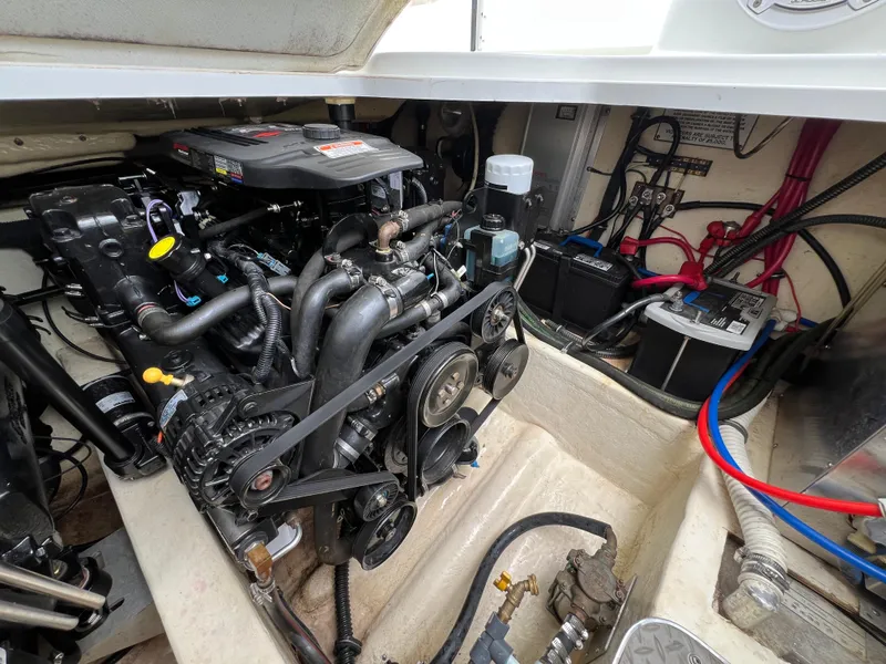 Slide: The Image of Engine compartment of a 2004 Formula 27 PC boat, showcasing detailed mechanical components. - 42