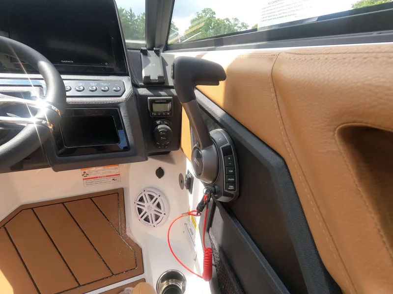 Slide: The Image of Interior of 2026 Cobalt R6 boat with steering wheel and control panel. - 16