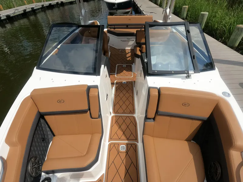 Slide: The Image of 2026 Cobalt R6 boat interior with tan leather seats and sleek design. - 20