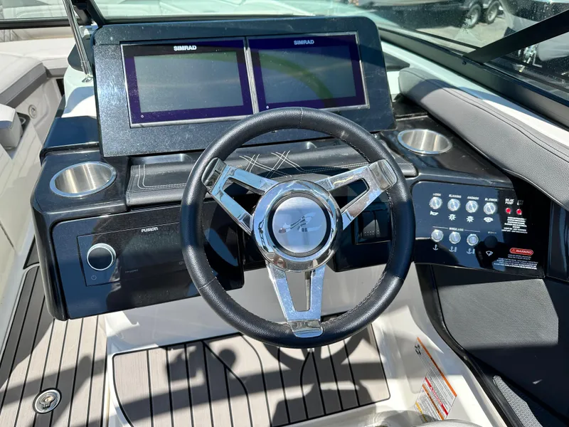 Slide: The Image of 2023 Sea Ray 260 SLX boat interior with sleek seating and modern design. - 10