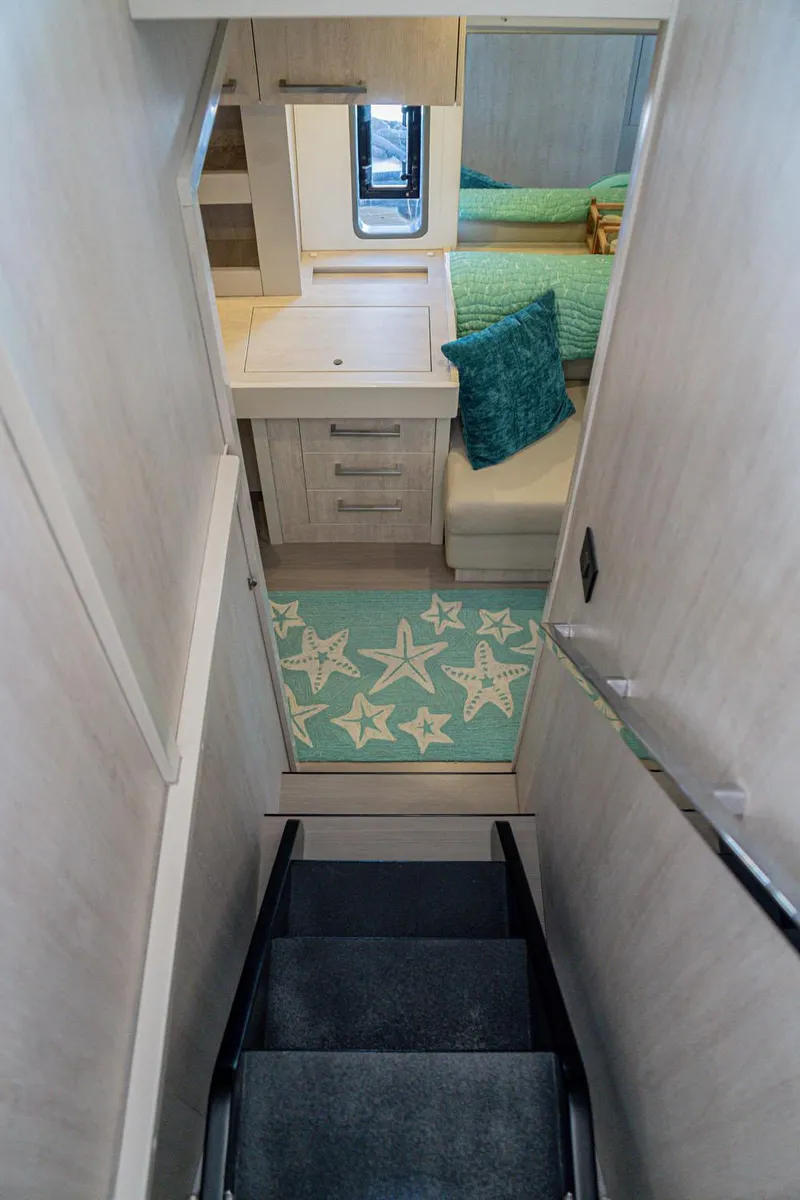 Slide: The Image of Starboard Companionway to Master Suite - 25