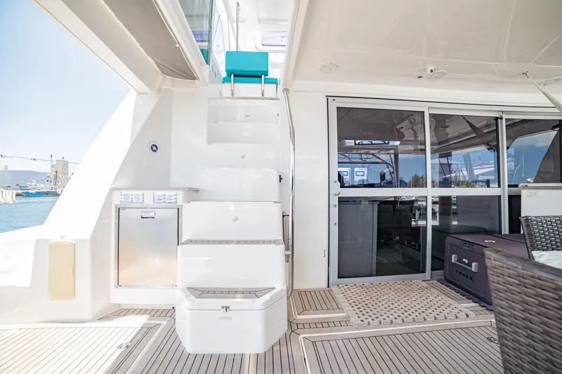 Slide: The Image of Access from Aft Deck to Flybridge - 60
