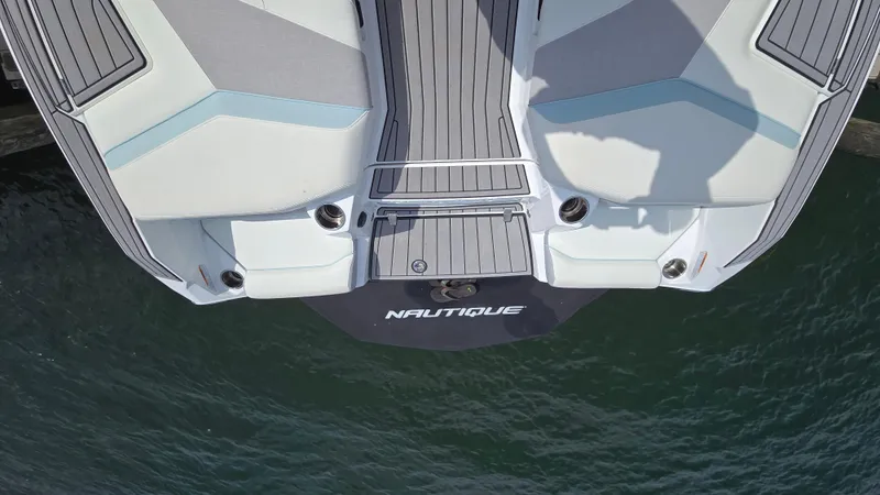 Slide: The Image of 2022 Correct Craft Super Air Nautique G23 boat deck, aerial view over water. - 29