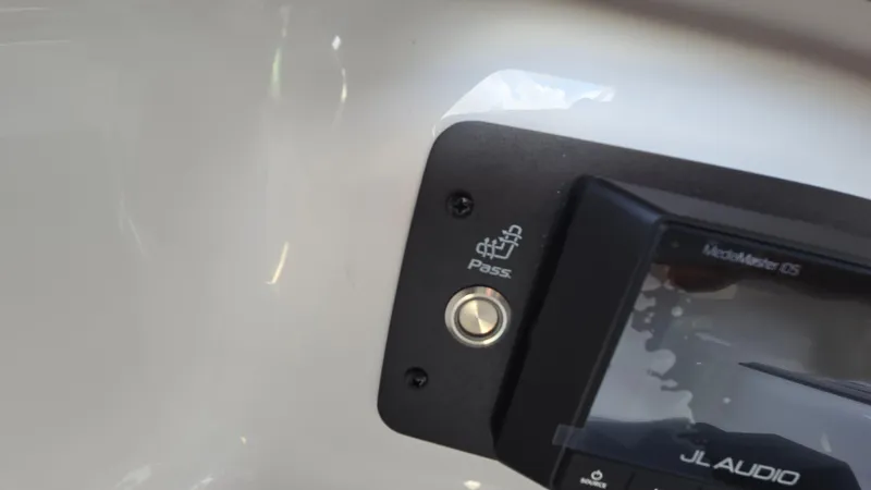 Slide: The Image of Control panel of 2022 Correct Craft Super Air Nautique G23 with JL Audio system. - 49