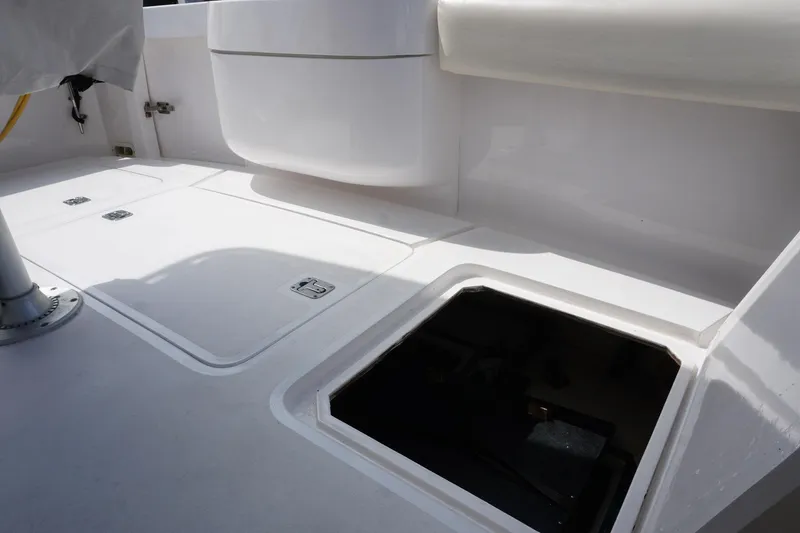Slide: The Image of 2005 Mirage Yachts 40 Convertible deck with open storage compartment. - 12