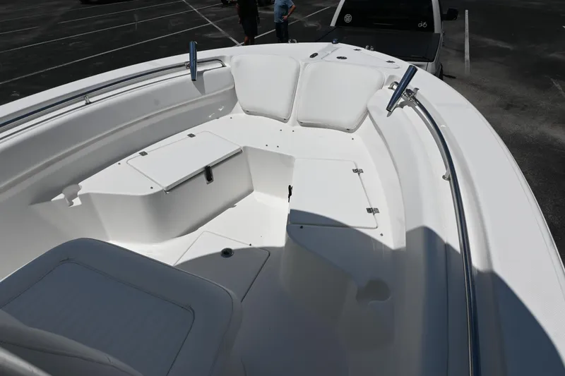 Slide: The Image of 2013 Sea Fox 226 Commander boat interior with seating and storage compartments. - 11