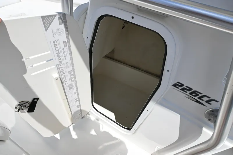 Slide: The Image of 2013 Sea Fox 226 Commander boat storage compartment with open hatch. - 17