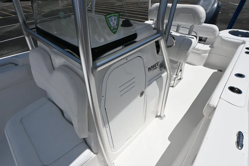 Slide: The Image of 2013 Sea Fox 226 Commander boat interior with white seating and console. - 18