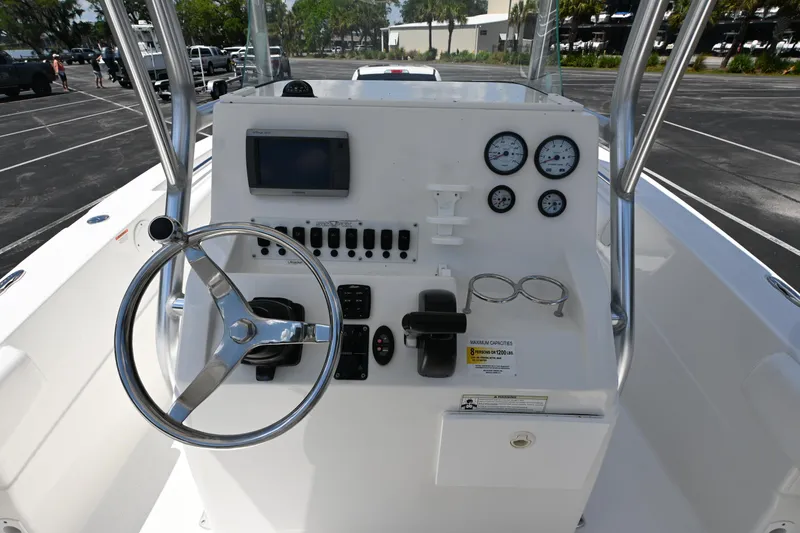 Slide: The Image of 2013 Sea Fox 226 Commander boat console with steering wheel and gauges. - 20