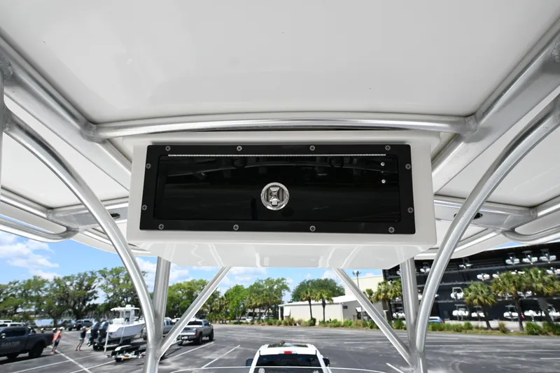 Slide: The Image of 2013 Sea Fox 226 Commander boat console with storage compartment, viewed from below. - 21
