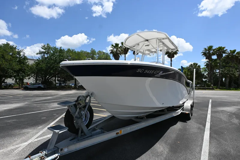 Slide: The Image of 2013 Sea Fox 226 Commander boat on trailer in sunny parking lot. - 4