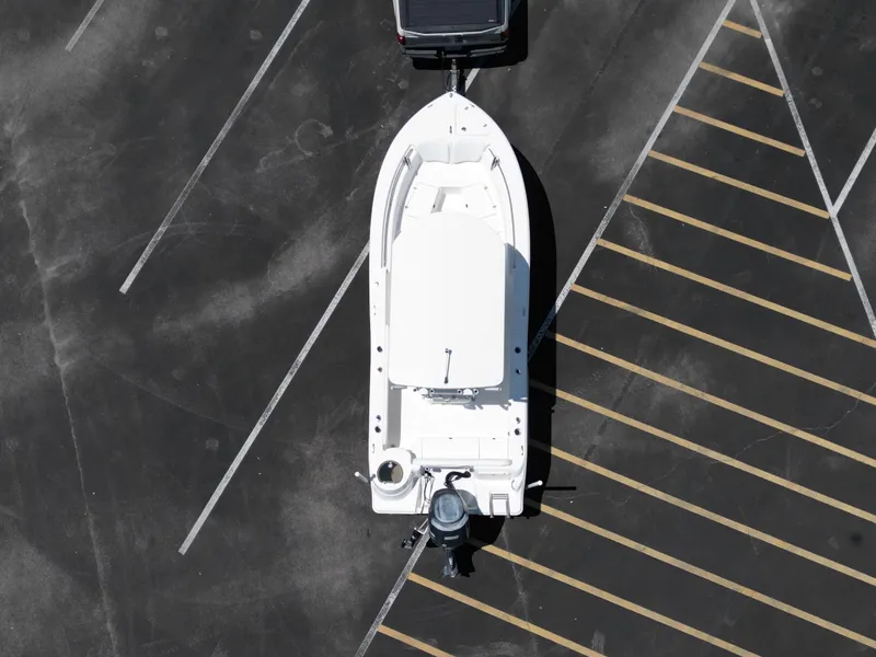 Slide: The Image of Aerial view of a 2013 Sea Fox 226 Commander boat on a trailer in a parking lot. - 7