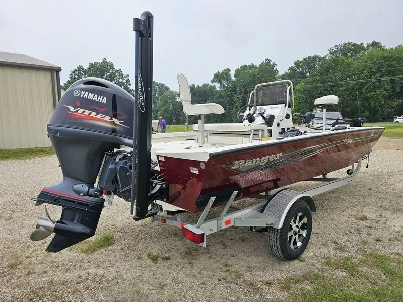 Slide: The Image of 2020 Ranger RB 190 boat with Yamaha engine on trailer, parked outdoors. - 5