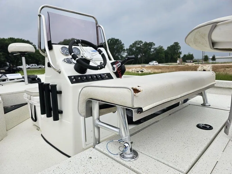 Slide: The Image of 2020 Ranger RB 190 boat interior with steering console and seating, outdoors. - 6
