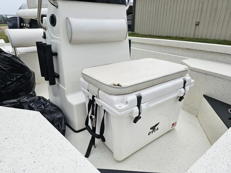 Slide: The Image of 2020 Ranger RB 190 boat interior with white cooler and seating area. - 7