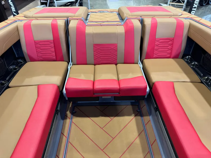 Slide: The Image of 2023 Malibu Wakesetter 26 LSV interior with red and tan seating. - 27