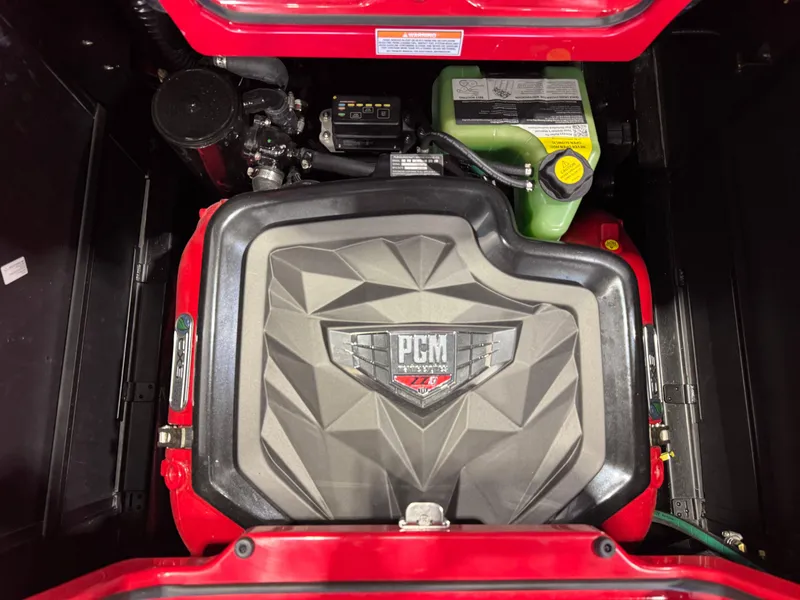 Slide: The Image of Engine compartment of 2024 Nautique Super Air Nautique G25, featuring PCM engine components. - 27