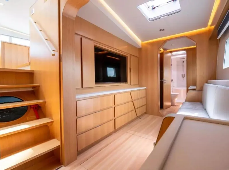 Slide: The Image of Luxurious interior of 2026 McConaghy MC63P Offshore yacht, featuring modern wood finishes and elegant design. - 14