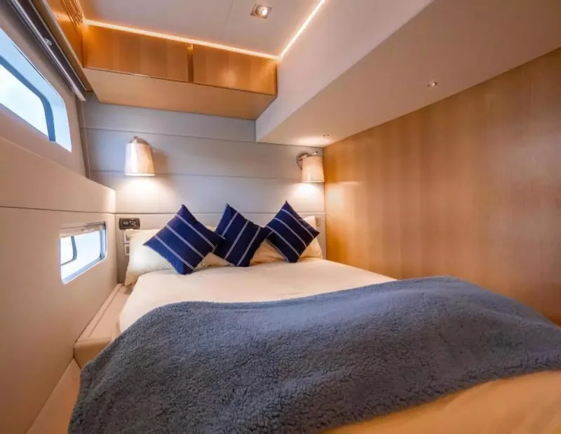 Slide: The Image of Luxurious cabin interior of 2026 McConaghy MC63P Offshore yacht with cozy bedding. - 20