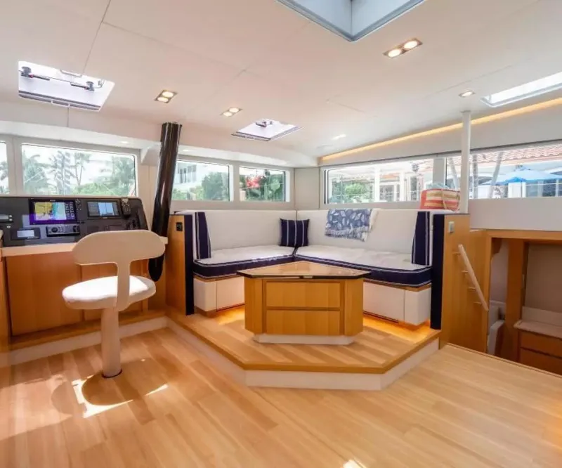 Slide: The Image of Luxurious interior of 2026 McConaghy MC63P Offshore yacht with modern seating and navigation area. - 7