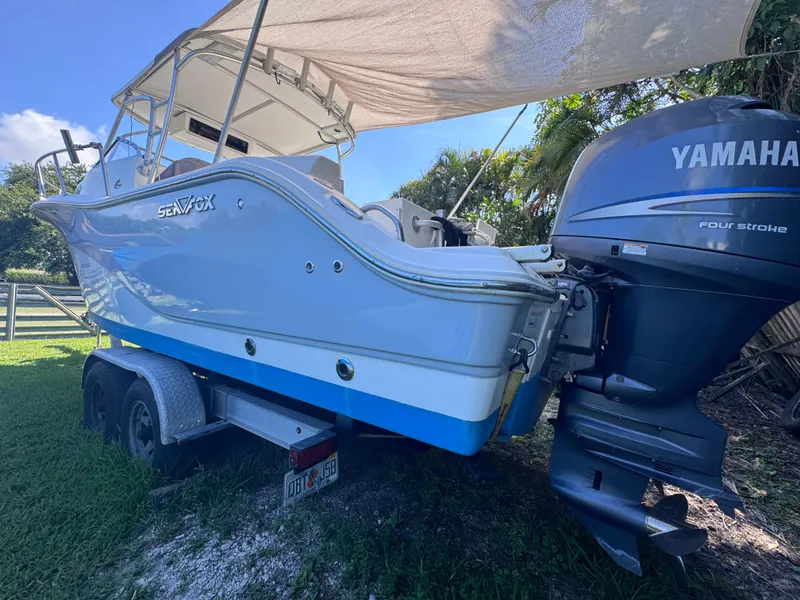 Slide: The Image of 2011 Sea Fox 256 WA Voyager boat with Yamaha outboard motor on trailer. - 12
