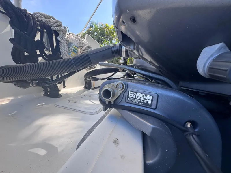 Slide: The Image of 2011 Sea Fox 256 WA Voyager boat engine detail with visible hoses and components. - 13